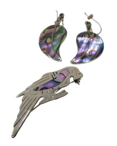 An Alpaca Mexican jewellery set, comprising leaf shaped earrings and bird brooch with plain pin...