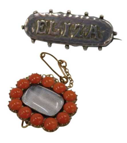 Two Victorian and later brooches, comprising a silver Eliza forget me not brooch, 4cm wide, and...