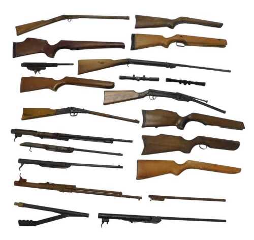 Air rifle parts, to include cocking mechanisms, stocks, etc. (a quantity) A photographic...