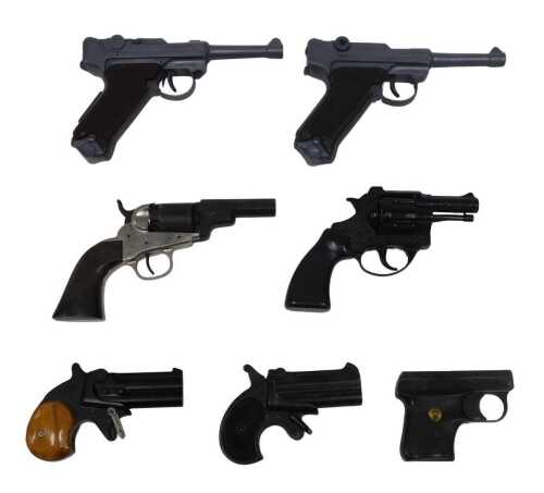 A collection of toy and replica guns, to include a pair of Luger cap guns, a Derringer, a EM-GE...