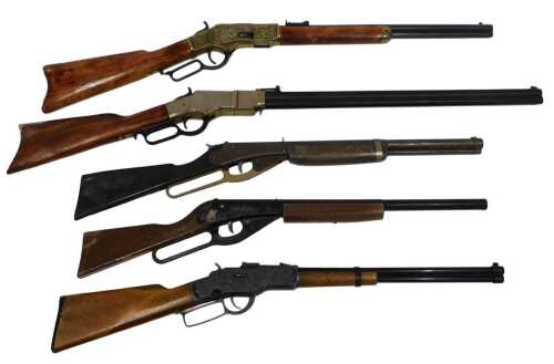 A small collection of replica wall hanging Winchester type rifles. 
A photographic identity...