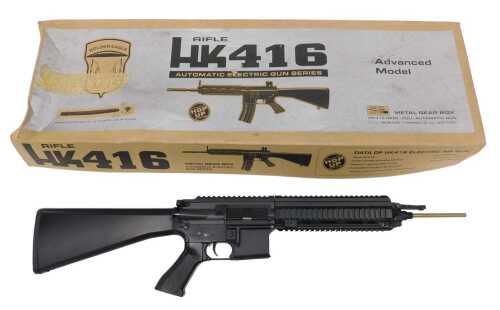 A Golden Eagle HK416 automatic electric BB gun, boxed. 
A photographic identity document, either...