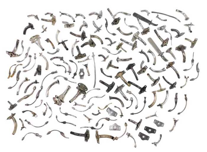 Various medical tracheostomy tubes, of shaped form with varying attachments, in white metal,...