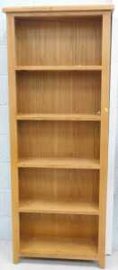 A light oak open bookcase, of five shelves.