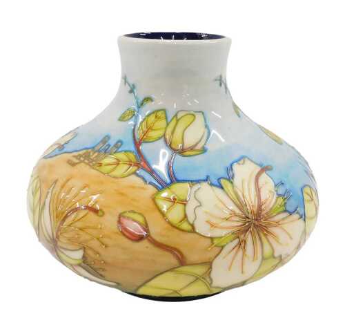 A Moorcroft pottery Caper's pattern vase, of squat bellied circular form, 18cm high.