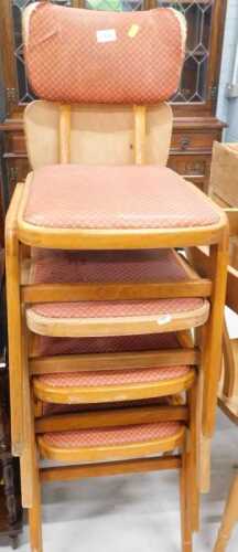 Various stacking chairs, with overstuffed backs and seats, with flock stuffing.