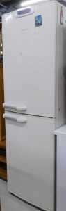 A Bosch fridge freezer, in white, number 033254 QC493.