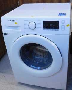 A Samsung washing machine, WW90TA046TE.