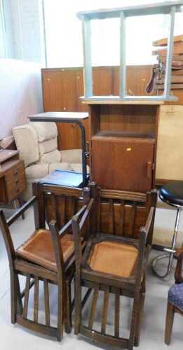 An oak dining room suite, comprising early 20thC drop leaf gate leg table and four associated...