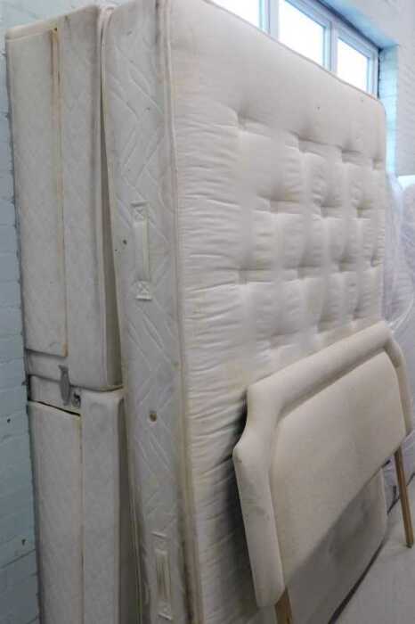 A 58" wide part floral mattress, with divan style base and headboard.