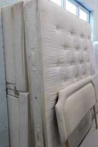 A 58" wide part floral mattress, with divan style base and headboard.