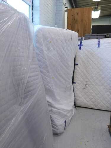 A 75" wide bed surround, sleigh type, in grey, with mattress in part covering, a 58" wide bed...