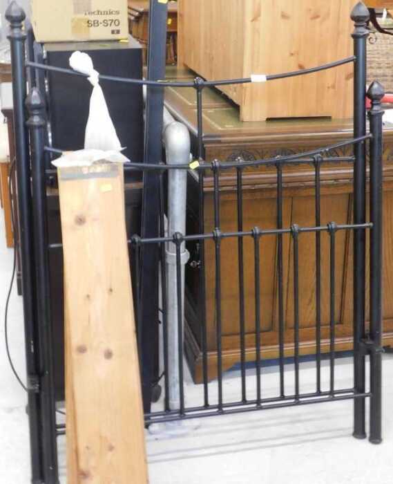 A 20thC iron single bed, comprising head and footboard, and pine slats. (a quantity)