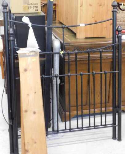A 20thC iron single bed, comprising head and footboard, and pine slats. (a quantity)