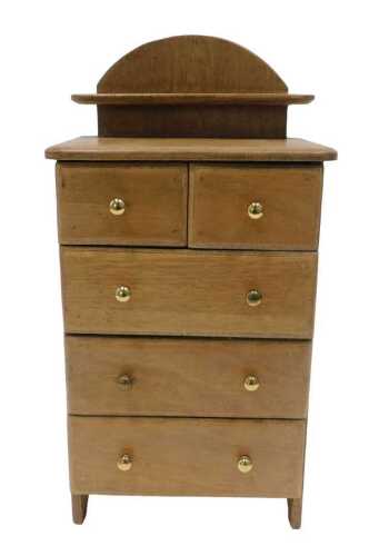 A 20thC beech tabletop jewellery box chest of two short and three long drawers, possibly an...