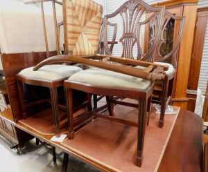 A Regency style twin pillar dining room suite, comprising D end table with leaf, on two pillars...