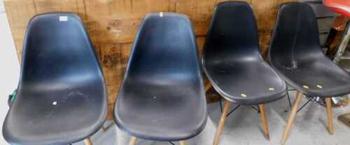 A set of four IKEA style black plastic chairs on turned lightwood legs, two high bar stools. (a...