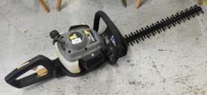 A Titan TTL531HDC hedge trimmer.