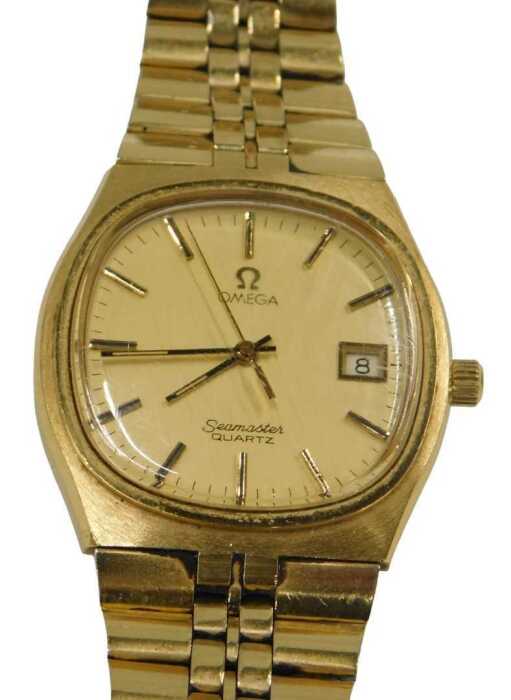 A gentlemen's Omega Seamaster quartz wristwatch, with 3cm diameter gold coloured face, marked...