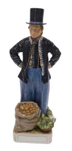 A Royal Copenhagen figure, Jan Hansen Schmidt by Carl Martin-Hansen, in standing pose with hands...