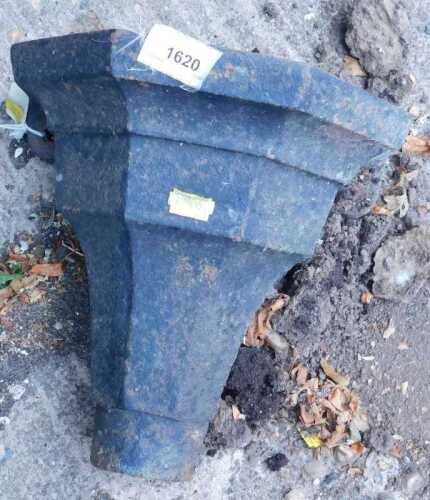 A cast iron drain hopper.