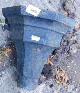 A cast iron drain hopper.