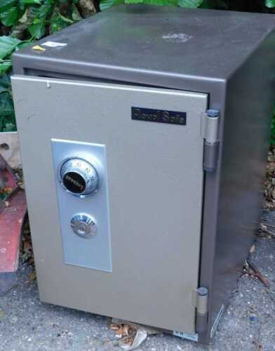 A Royal freestanding metal safe.