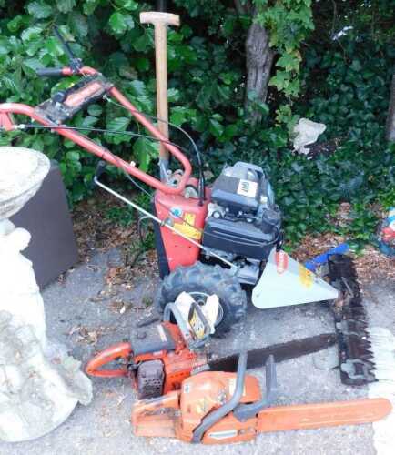 A Shanks Pony CG135 commercial garden rotavator, other tools, chainsaw, etc. (a quantity)