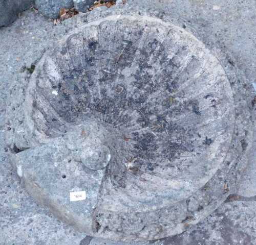A classical design rococo style bird bath top.