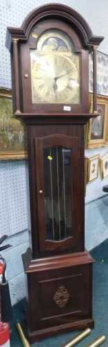 A late 20thC longcase clock, with arched dial and moon rolling movement, 23cm diameter...