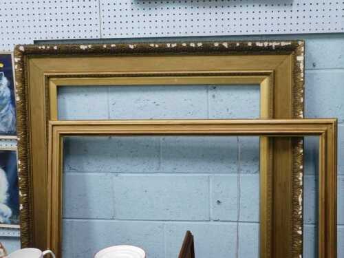 An ornate gilt picture frame, 148cm x 123cm, together with a second gilt picture frame, 121cm x...