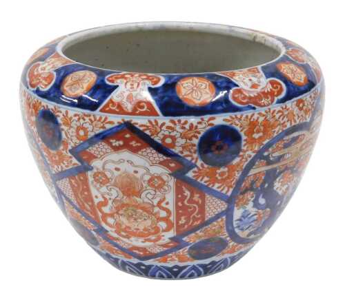 A 19thC Japanese Meiji period Imari pattern jardiniere, of tapering circular form, decorated...