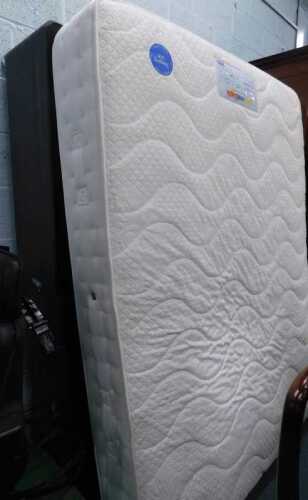 A 54" wide Easy Rest Beds memory foam mattress, on a double divan base.