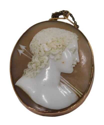 A 19thC shell cameo brooch, formed as a maiden with curled hair looking dexter and two arrows...