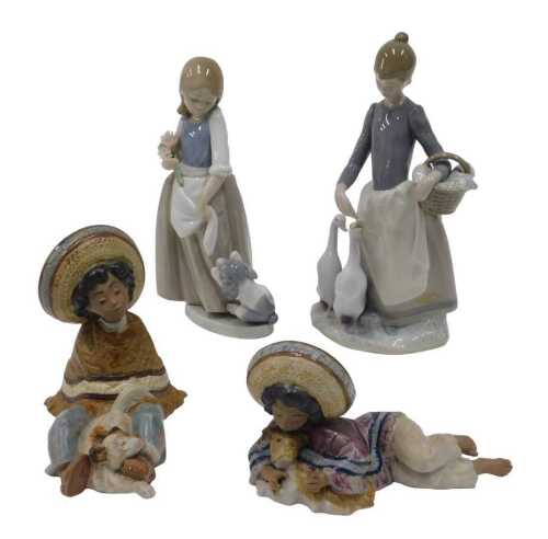 Various Lladro and other figures, to include Julio With Dog, number 2168, 18cm wide, another...