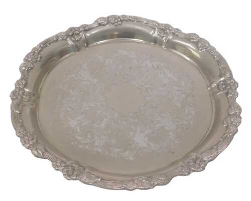 A 20thC silver plated dish, of shaped circular form, the inner section with a chased scroll and...