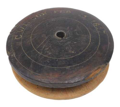 A George IV 19thC wooden industrial reel, marked C Wilson February 15th 1817, 23cm diameter.