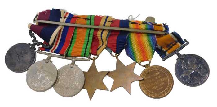 A WWI and WWII medal group, comprising WWI Victory and Campaign medals, WWII Victory Campaign...