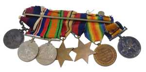 A WWI and WWII medal group, comprising WWI Victory and Campaign medals, WWII Victory Campaign...