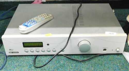 An Acoustic Solutions SP101 amplifier, and remote.