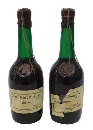 A bottle of Carvalho Reserva Pereira, and another similar. (2)