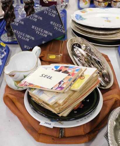 A leather Gladstone style bag, a quantity of tea cards, Worcester gravy boat on stand, silver...