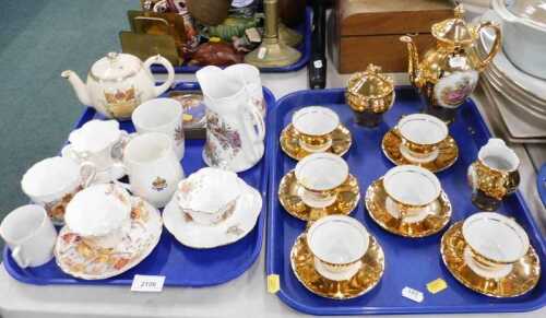 A gilt Limoges style part coffee service, to include coffee pot, milk jug, two handled sugar...