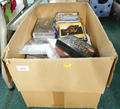 Various CDs, music CDs, Christmas Line Dancing, videos, Priest, various other DVDs, The Queen,...