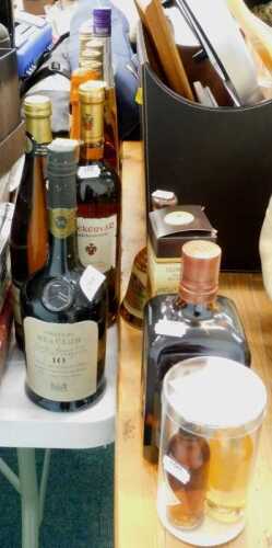 A bottle of Bucks Fizz, a bottle of Chateau de Beaulon 10 Year Old Vieille Reserve Or Pineau des...