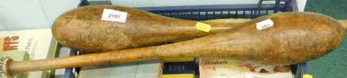 A pair of wooden Indian clubs or exercise meels, probably early 20thC, of teardrop shape.