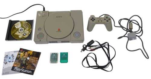 A Sony PlayStation I console, 31cm wide.