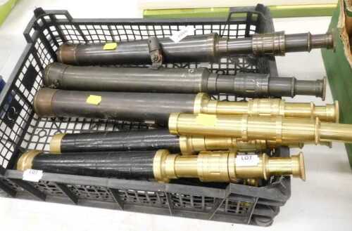 Various vintage brass articulated telescopes, of cylindrical form, some with taped sections with...