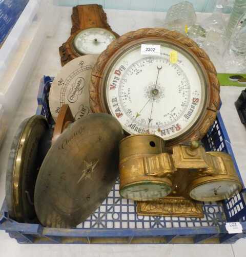 Various barometers, early 20thC rope twist wall barometer, with 20cm diameter dial, a two...