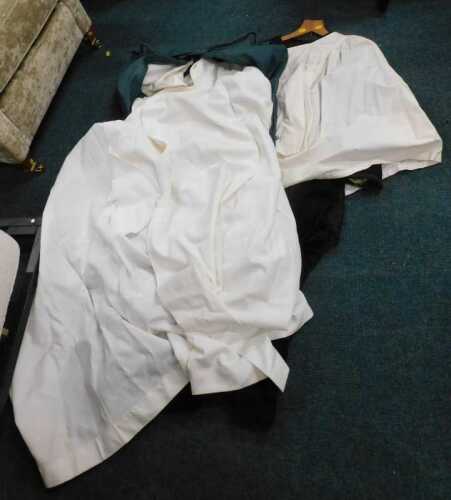 Various clothing, a religious vestment with St Martin label in suit bag, and a further religious...